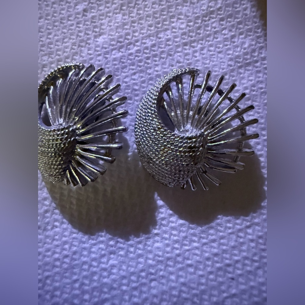 Elegant Silver Spiral Clip on Earrings by‎ Sarah Coventry.